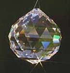 Crystal Ball Sparkling in Sun and Making Rainbow Colors on its surface. Swarovski Suncatchers make rainbows that fly far away from the crystal, and decorate walls, floors, and everything in the room with their brilliant colors! Children & Pets love to chase the rainbows! Rainbow Crystals!