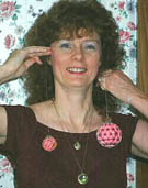 Karen holding Swirl Ball 40mm at Left and Big Gorgeous 70mm Crystal Ball at Right. Red color is reflected from clothing! ballk05a1.jpg