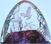 Eagle in Flight to its Chick in the Nest. Gorgeous Crystal Figurine. 65mm Size with Always Changing Iridis Colors.