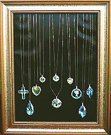 Display of Crystal Pendants on Gold Chains