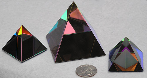 Sparkly and Colorful Crystal Pyramids to Sit on a Shelf and Entertain You As You Pass! From Left to Right Sizes are 40mm, 60mm, and 40mm, all with Peacock Color Coating. Pyramid at Right has an Carved Frosted Additional Pyramid Inside.