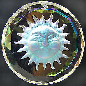 Crystal Sun Coin with Faceted Edges, Carved Frosted Sun Face, and Gold AB. Enlarged to Show Detail.
