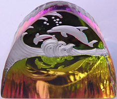 Crystal Figurine with Carved Frosted Double Dolphins in a Colorful Luminescent Sea. Enlarged to show detail. Actual size is 2.5 Inches Wide, 2.25 Inches Tall. Colors keep changing!