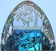 Crystal Figurine with Carved Frosted Unicorn in a Colorful Luminescent Crystal Forest. Enlarged to show detail. Actual size is 2.5 Inches Wide, 2.25 Inches Tall.