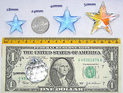 Dollar Bill, Two Rulers, US Quarter, and Four Crystals. Crystals are Star 28mm Blue, Star 40mm Blue, Star 50mm ab, and Ball 30mm (on the bill).